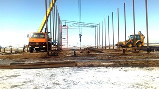Аренда экскаватора погрузчика с ямобуром в Тихвин цена от 1569 руб